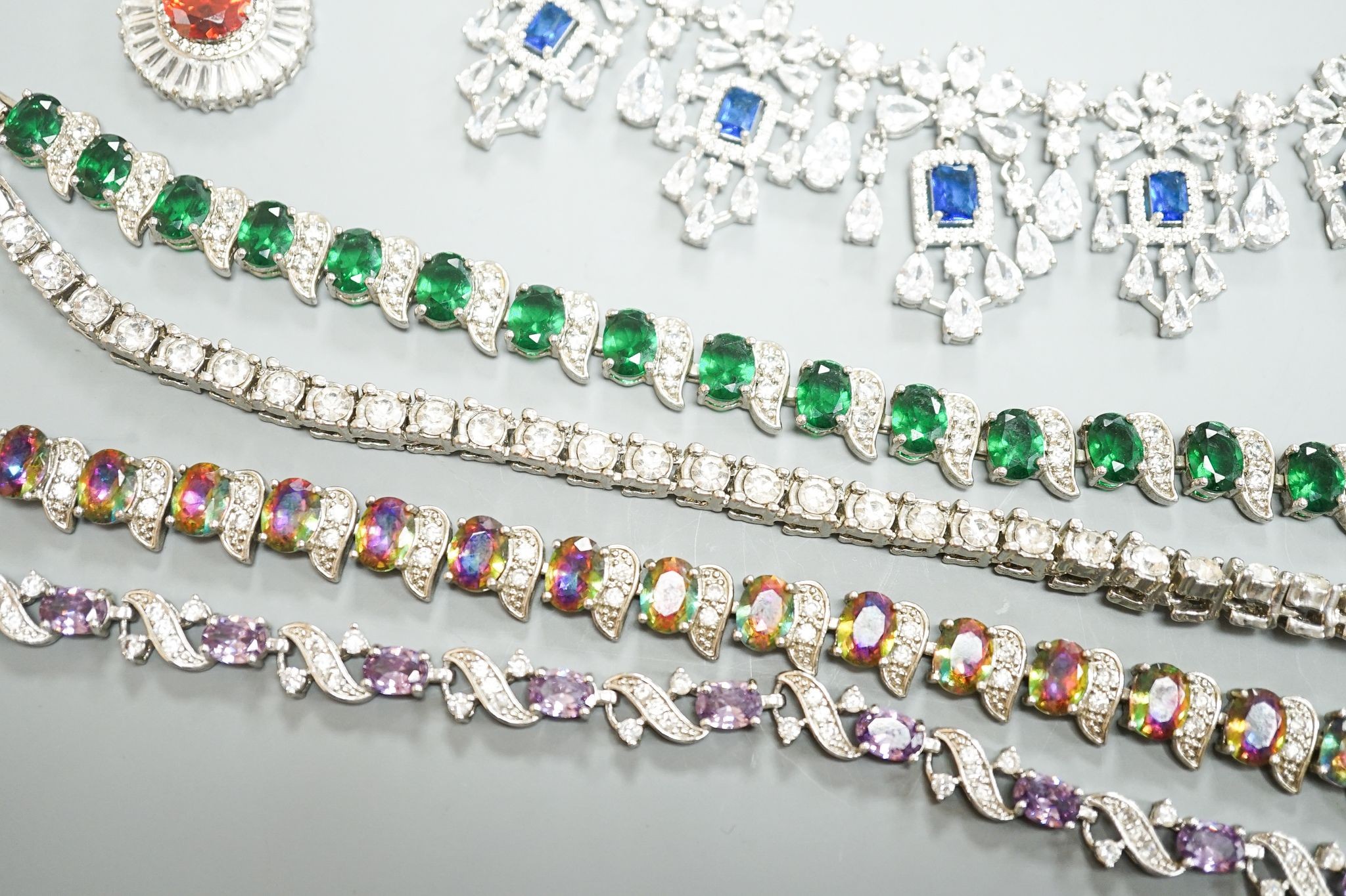 A small group of 925 or white metal and paste set jewellery, including necklaces, bracelets and earrings.